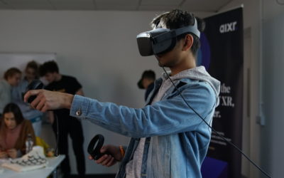 A boy trying VR headset at Academy of International Extended Reality XRGeneration program